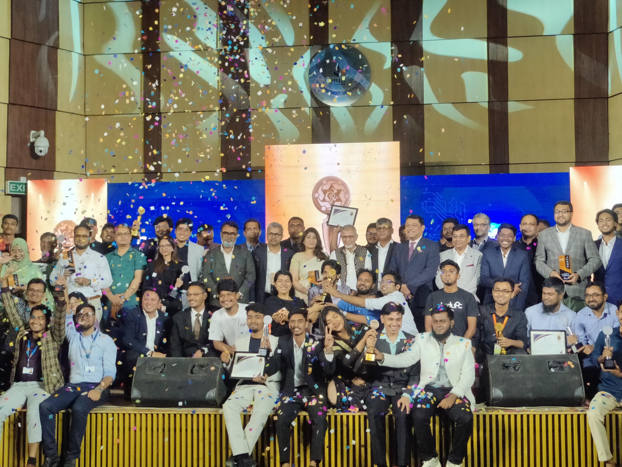 All winners celebrating at ICT Innovation Awards 2025 with confetti